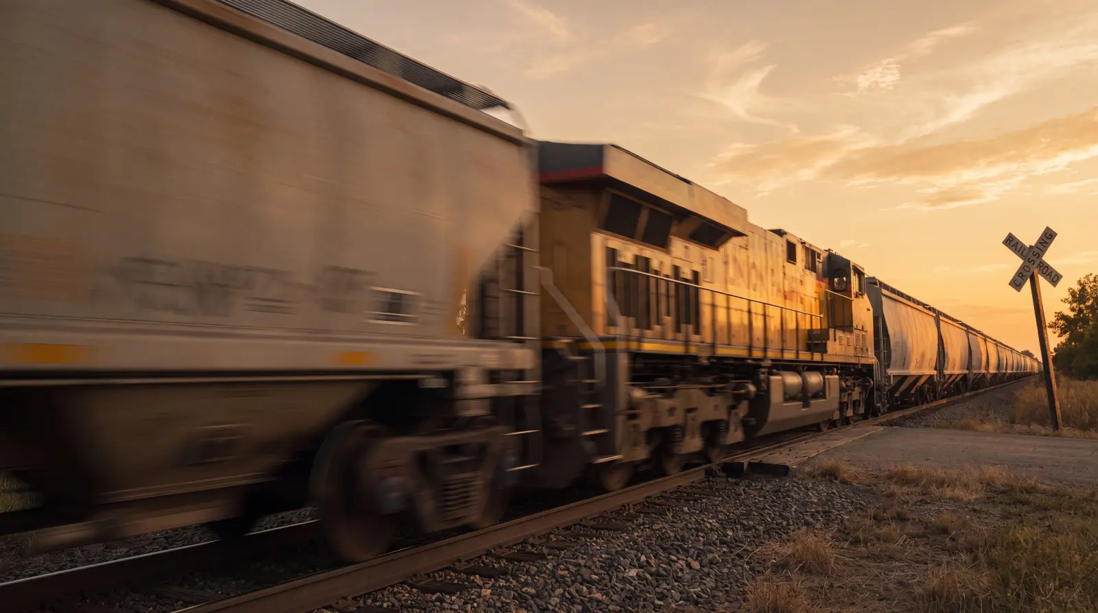 Final look, shot 02F: the freight train slamming past the crossing